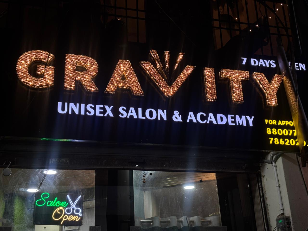 Gravity Unisex Salon & Academy storefront — illuminated signage in Dilshad Garden, Delhi